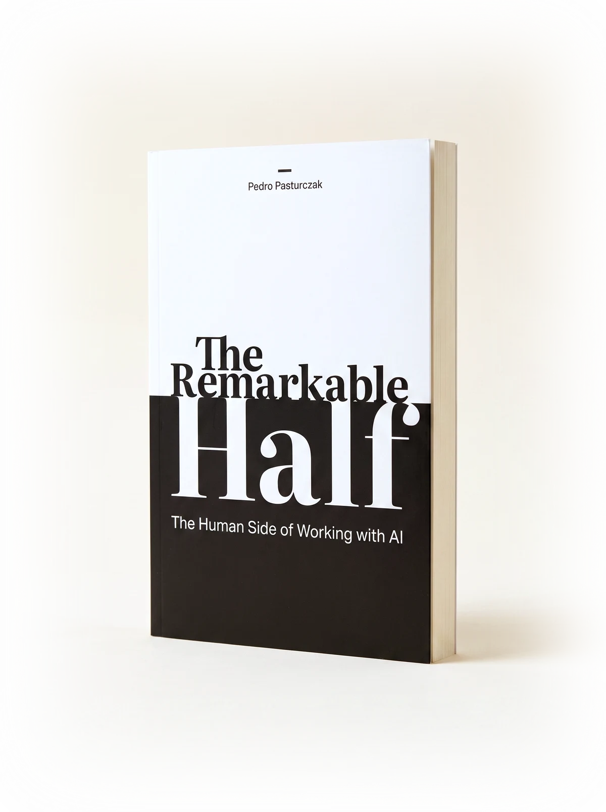The Remarkable Half by Pedro Pasturczak — black and white cover split horizontally, the word Half crossing the boundary and inverting colour